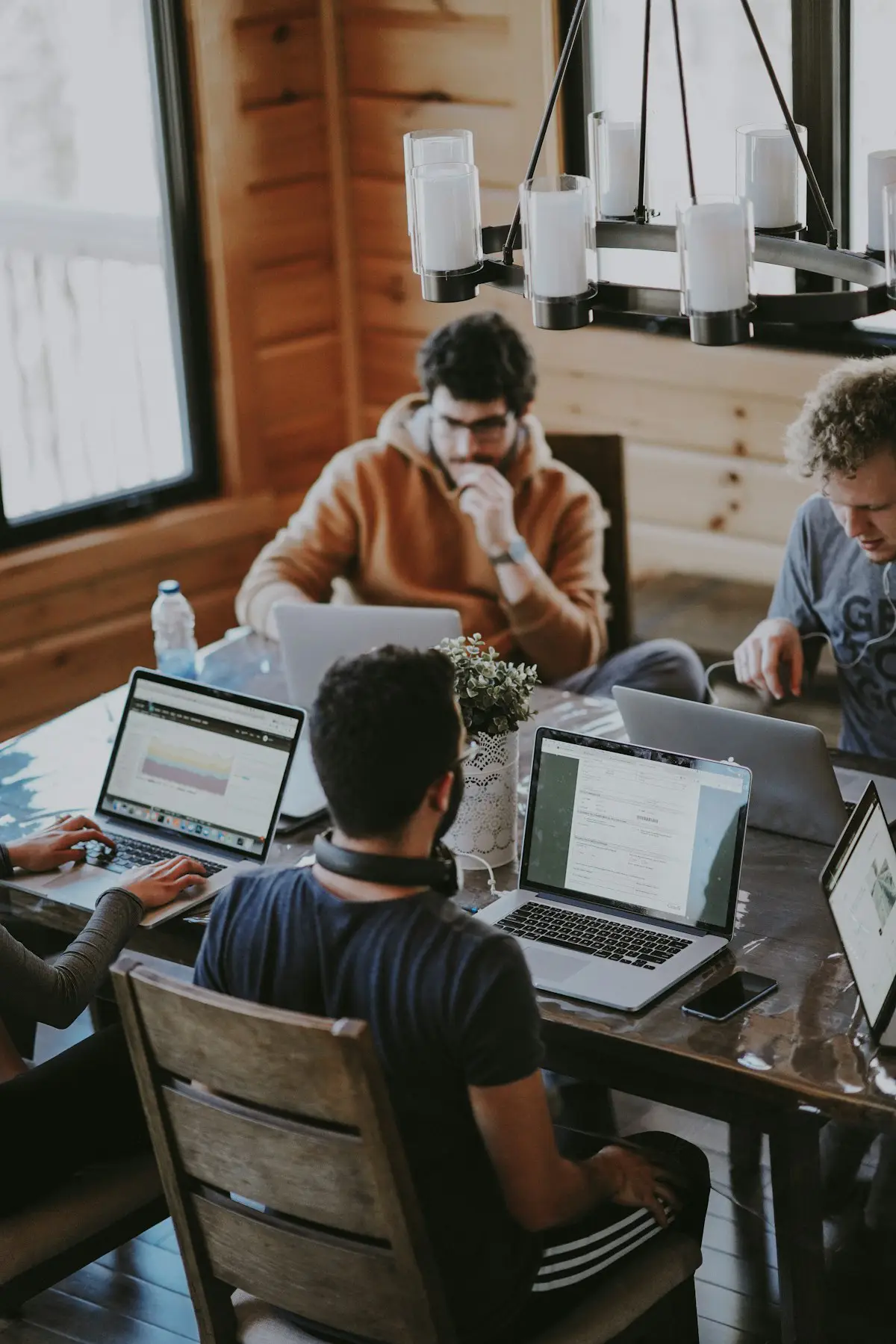 Professionals coordinating ownership and delivery