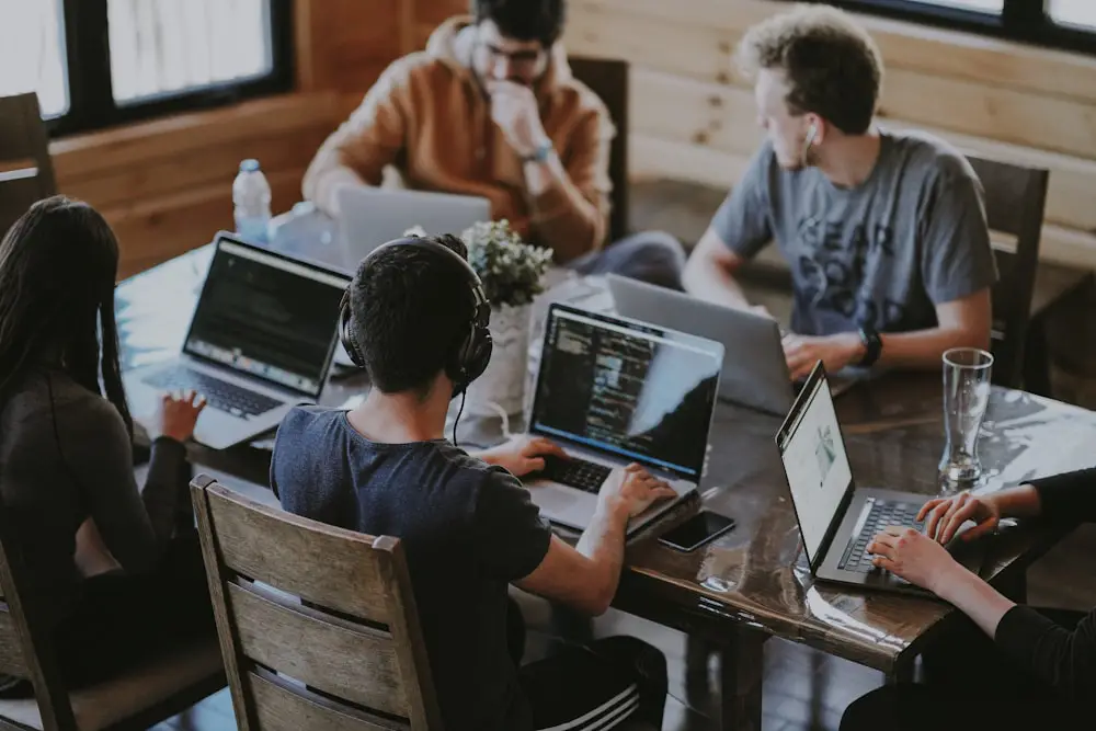 Professionals coordinating ownership and delivery